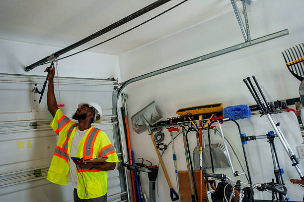 Professional Garage Door Panel Replacement technician working in Peoria, IL